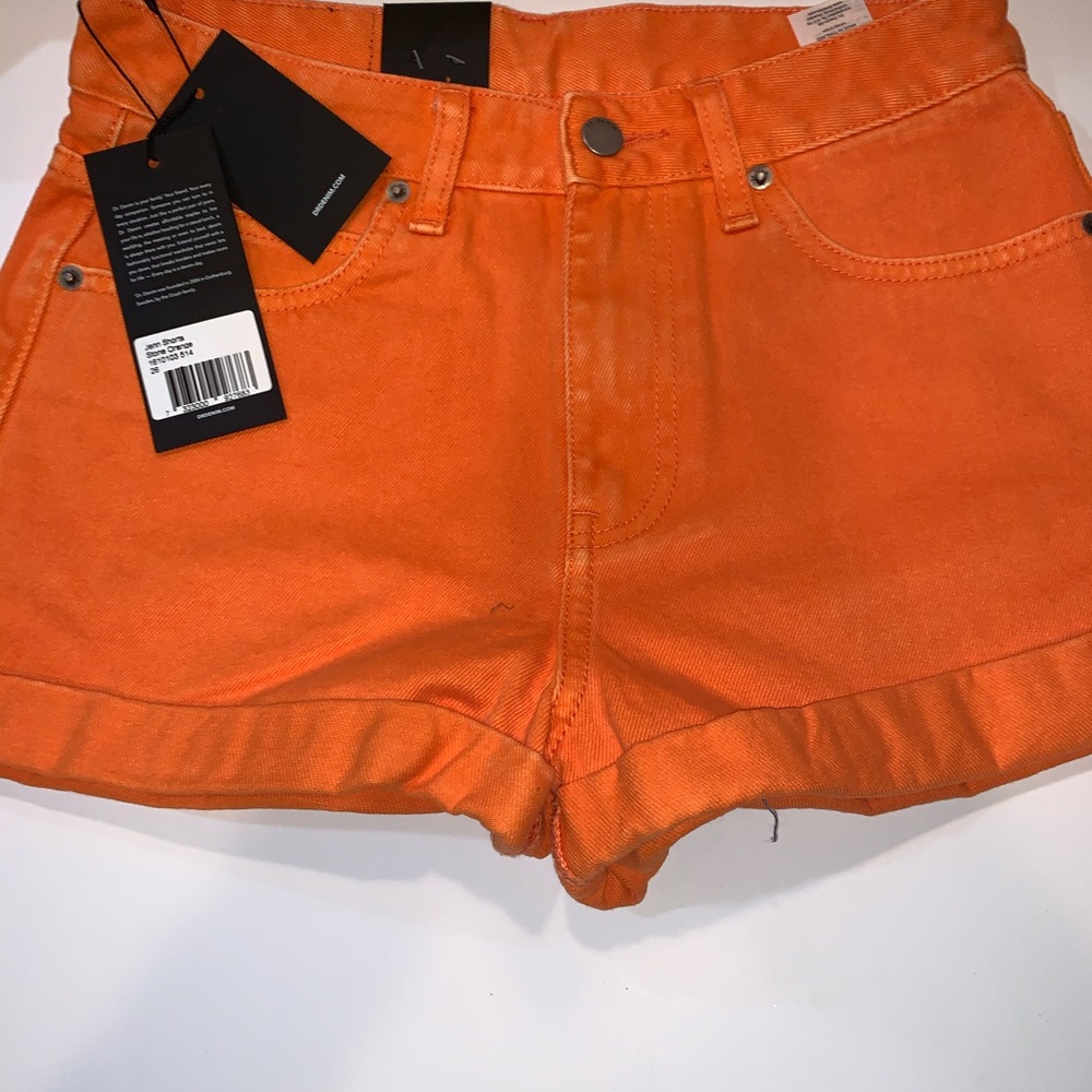 Drdenim orange denim shorts.